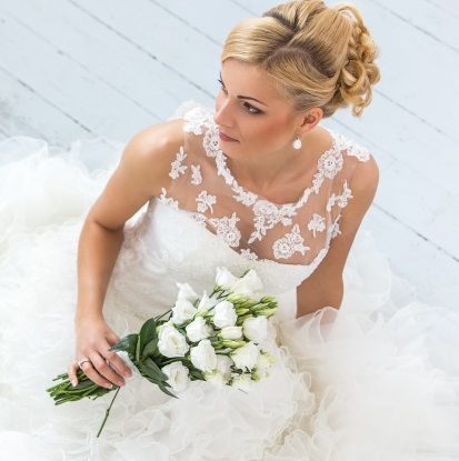 Wedding. Attractive bride with bouquet